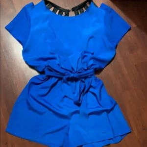 Jumper blue and in the back open